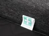 A close-up of a label with a medical cross and the word 'MEDICAL' on a dark fabric. Náhled obrázku produktu