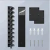 Schwarzer Wand-Hutständer mit zehn gebogenen Haken, mit zwei Klebemontageplatten, vier Schrauben und vier Dübeln Voir les images du produit