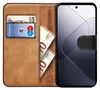 A book-style phone case with slots for cards and cash, shown open with a smartphone inside. Produktbild-Vorschau