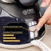 A hand is shown pressing a button on a steam iron station, with labels pointing to different features. Produktbild-Vorschau