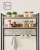 A kitchen shelf unit with shelves, hooks, and mugs. Náhled obrázku produktu