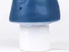 A close-up view of the base of a mushroom-shaped lamp. Produktbild-Vorschau