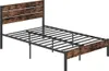 A metal bed frame with a wooden-look headboard and footboard, shown against a white background. Podgląd zdjęcia produktu