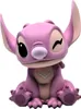 A pink figurine of the character Angel from Lilo & Stitch, sitting and winking. Anteprima dell’immagine prodotto