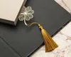 Signet à pompon en forme de trèfle à quatre feuilles doré + Voir les images du produit 2