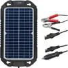 A solar battery charger with various cables and connectors. Produktbild-Vorschau