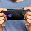 A person is holding a smartphone horizontally, likely playing a game. Produktbild-Vorschau