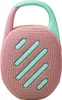 A close-up studio shot of a pink and mint green JBL Clip 5 Bluetooth speaker with a carabiner clip. Produktbild-Vorschau