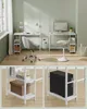 A collage of images showing two white desks set up in a home office environment, with detailed close-ups of the shelving units. Produktbild-Vorschau