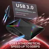 A futuristic-looking TV box with colorful LED lights is shown against a dark, cosmic background with streaks of light and a rocket. Podgląd zdjęcia produktu