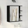 A black bathroom cabinet with a mirror and shelves is mounted on a tiled wall. Produktbild-Vorschau