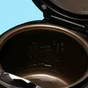 Close up shot of the interior of an open pressure cooker. Anteprima dell’immagine prodotto