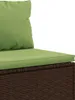 Close-up of a brown rattan sofa with green cushions. Náhľad obrázku produktu
