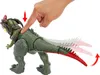 A hand is shown pressing down on the back of a toy dinosaur, demonstrating a feature that causes its tail to move. Náhľad obrázku produktu