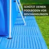 Blue pool mats are laid out on green grass next to a blue swimming pool. Produktbild-Vorschau