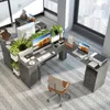 A modern L-shaped desk setup in a home office environment with plants and computers. Produktbild-Vorschau