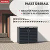 A modern, dark gray, two-bin trash can enclosure is shown in front of a white wall with decorative openings, next to a building entrance with stairs. Náhled obrázku produktu
