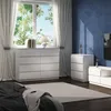A bedroom scene with a white dresser, a window with curtains, and a blue wall. Voir les images du produit