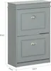 A gray wooden shoe cabinet with two flip-down drawers and silver handles. Dimensions are indicated by white text and lines. Produktbild-Vorschau