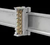 A close-up shot of a terminal block mounted on a DIN rail. Produktbild-Vorschau