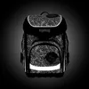 A black and white image of a backpack with a speckled pattern and reflective elements. Produktbild-Vorschau