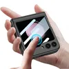 A person's hands are holding a dark green flip phone case with a screen protector, and a finger is interacting with the screen. Produktbild-Vorschau