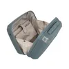 An open beauty case with internal compartments. Anteprima dell’immagine prodotto