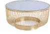A gold wireframe coffee table with a smoked glass top. Produktbild-Vorschau