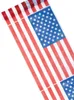 A close-up, diagonal view of a roll of table runner with the USA flag pattern. Náhled obrázku produktu