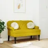 A yellow velvet bench with two round white cushions in a room with a plant and a white closet. Produktbild-Vorschau