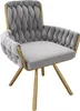 A single gray armchair with gold legs against a white background. Produktbild-Vorschau