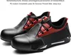 A pair of black and red safety shoes on a white background. Produktbild-Vorschau