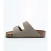 A side view of a single Birkenstock sandal against a white background. Produktbild-Vorschau