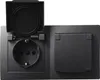 A black electrical outlet with a protective cover and a separate covered outlet. Produktbild-Vorschau