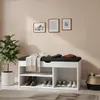 A shoe cabinet with a bench seat in a hallway, decorated with framed pictures and a plant. Náhľad obrázku produktu