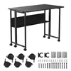 A black folding table with a shelf and wheels, along with its accessories, displayed against a white background. Produktbild-Vorschau