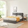 A bedroom scene with a bed, nightstand, and floor lamp. Voir les images du produit