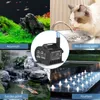 Collage of four images showing different applications of a water pump: an aquarium, a cat drinking water, a garden pond with koi fish, and a fountain. A close-up of the water pump is also visible. Produktbild-Vorschau