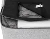 A close-up view of a dog bed with a zipper partially open, revealing the filling and a white sheet. Náhľad obrázku produktu