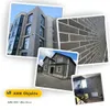 Hausfassade mit AMK Fassadenpaneelen 200 Mix-Grau in moderner Ziegeloptik Produktbild-Vorschau