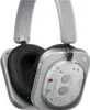 A close-up, studio shot of a pair of white and silver headphones. Náhľad obrázku produktu