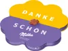 A flower-shaped box of Milka chocolates. Produktbild-Vorschau