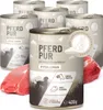 Several cans of dog food are arranged with raw meat in front of them. Produktbild-Vorschau