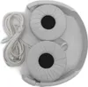 A top-down view of white headphones with a white cable and a 3.5mm jack. Podgląd zdjęcia produktu