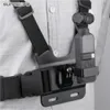 A person wearing a chest mount for a camera. Anteprima dell’immagine prodotto