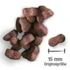 A pile of dog food kibble with a size indicator. Produktbild-Vorschau