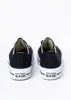 A pair of black Converse Chuck Taylor All Star Lift Ox sneakers shown from the back. Voir les images du produit