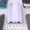 A power bank is shown surrounded by smartphones, suggesting its use for charging multiple devices. Náhled obrázku produktu