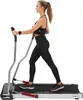 A woman is using an electric trainer for Nordic walking. Voir les images du produit