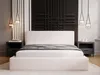 A bedroom with a bed, nightstands, and decorative wall art. Náhled obrázku produktu